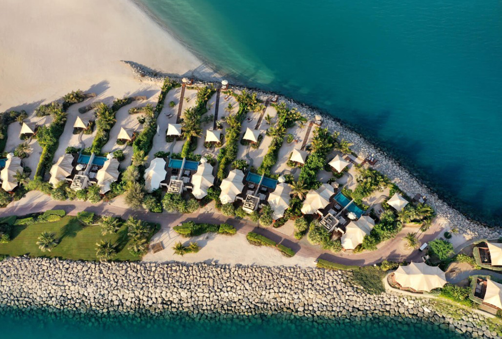 The Ritz-Carlton RAK, Al Hamra Beach: Your Luxurious Private Coastal Sanctuary