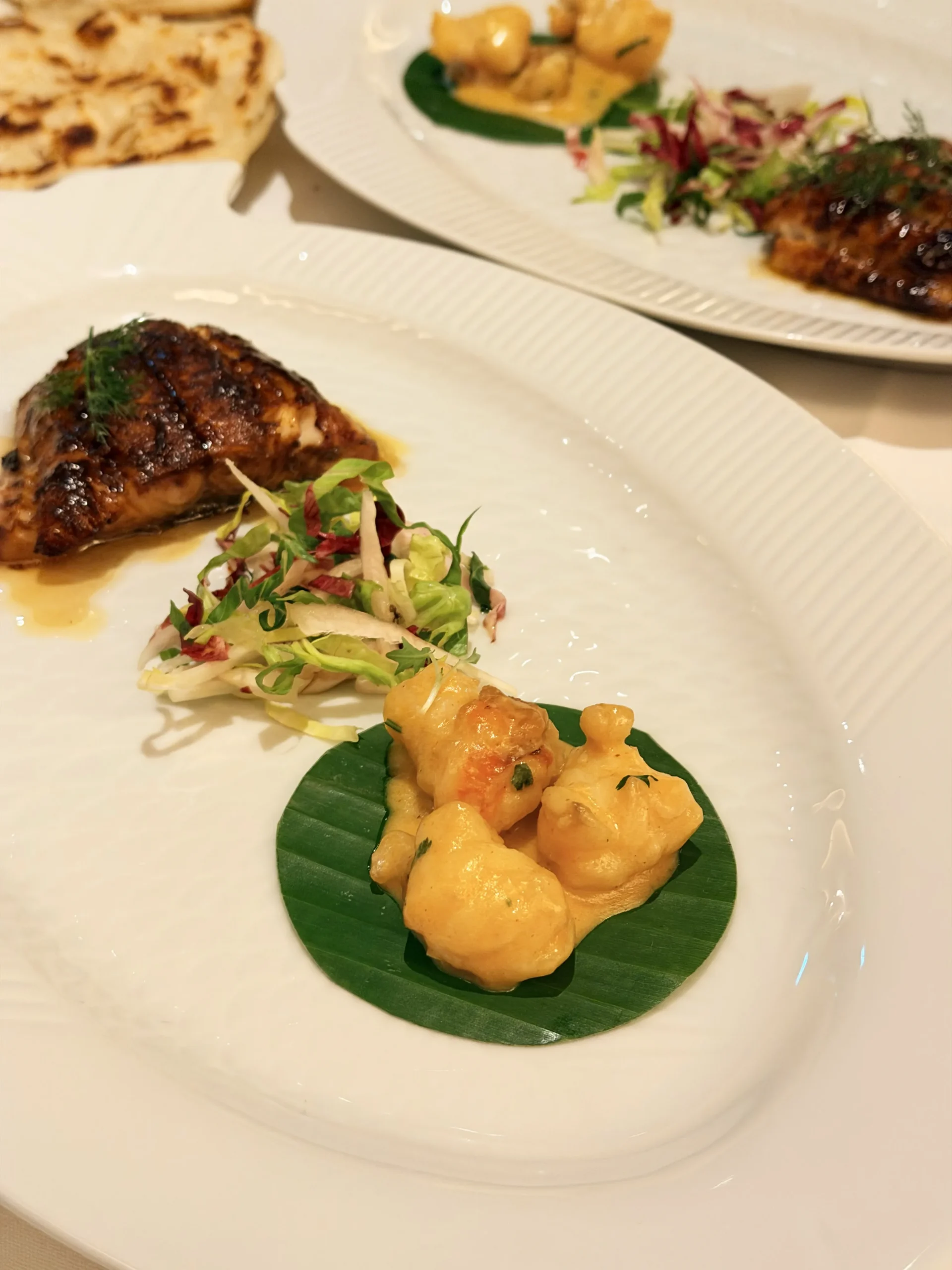 Fresh lobster prepared in a rich butter, pepper, and garlic sauce at Quilon London.