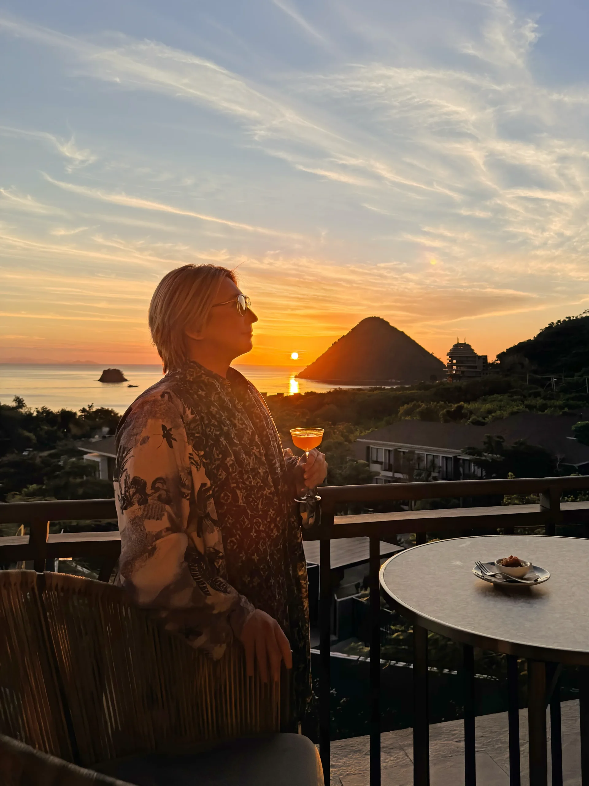 Stefano Malachi experiencing the signature Sunset Ritual at Nera Lounge, set against the golden hour glow at Ta'aktana, a Luxury Collection Resort and Spa.