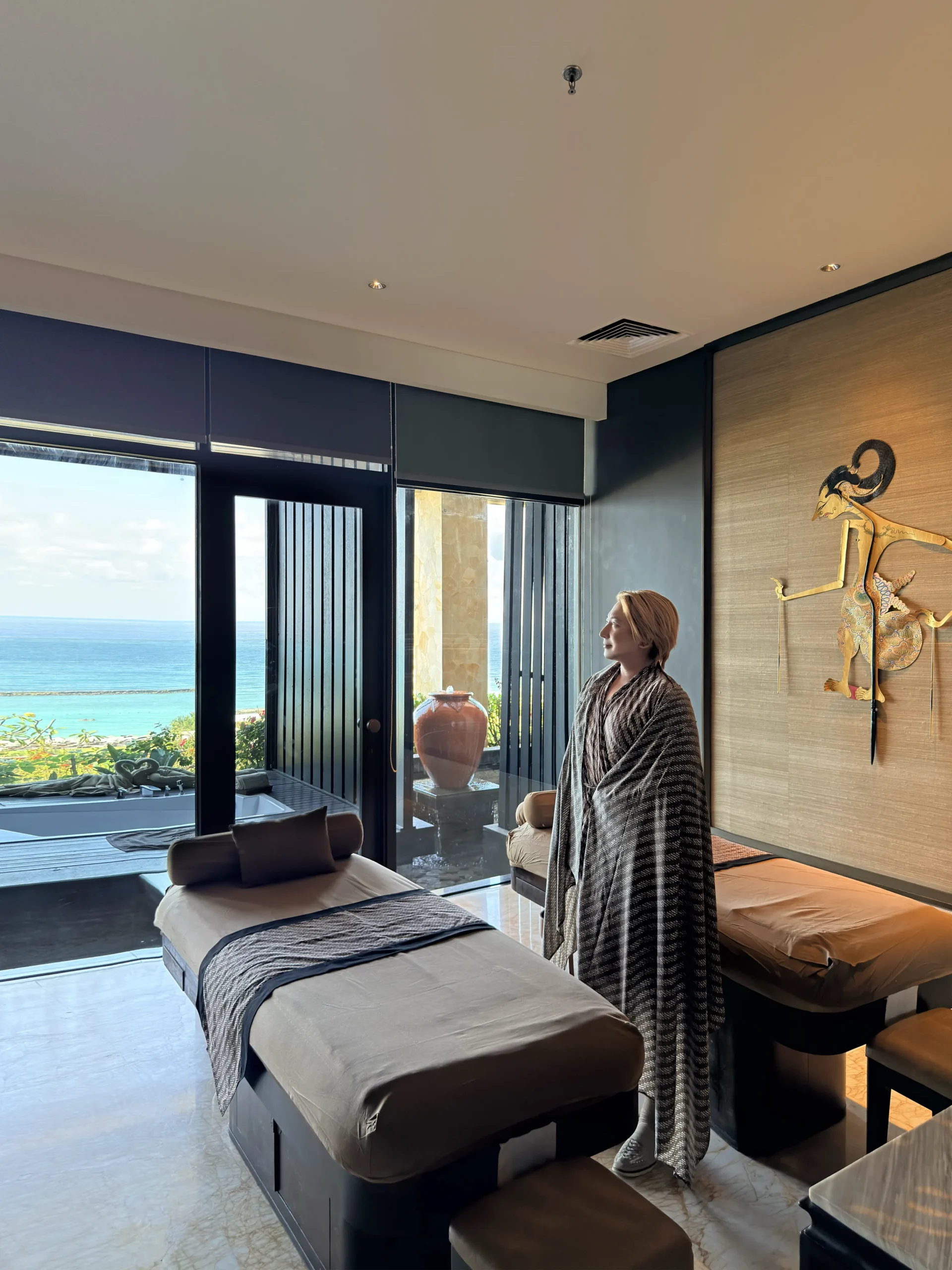 Stefano Malachi experiencing a holistic wellness ritual at The Apurva Spa within The Apurva Kempinski Bali, surrounded by tranquil design inspired by ancient Indonesian healing traditions.