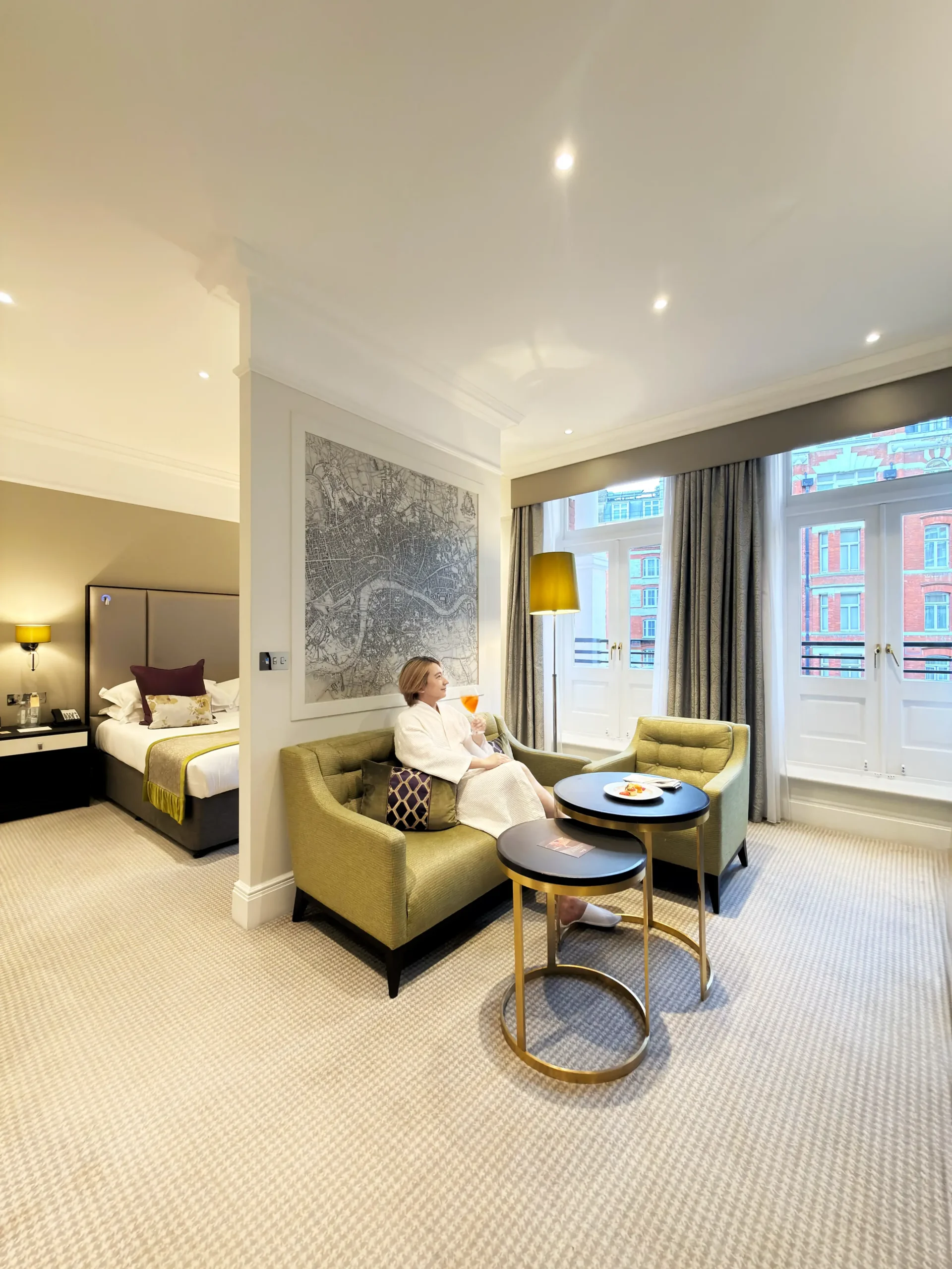 Stefano Malachi relaxing in a spacious, elegantly appointed luxury suite at Taj 51 Buckingham Gate Suites and Residences in central London.