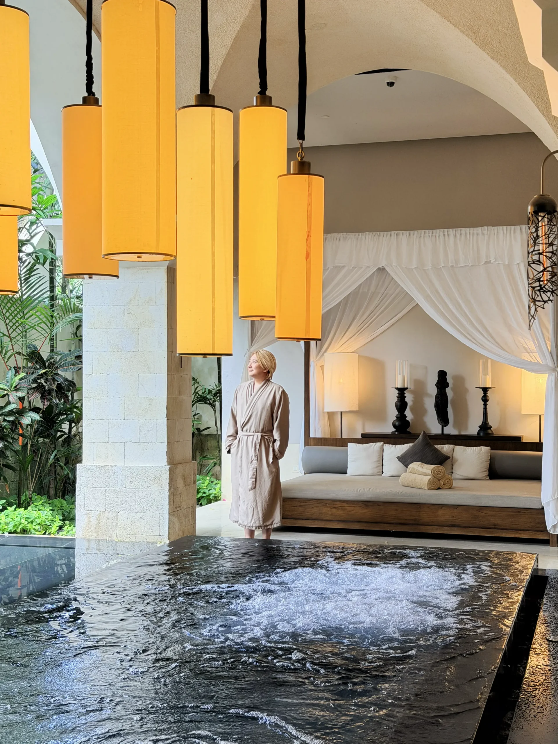 Stefano Malachi experiencing a luxurious wellness and relaxation treatment at Talise Spa within Jumeirah Bali, surrounded by tranquil tropical and water palace-inspired design.