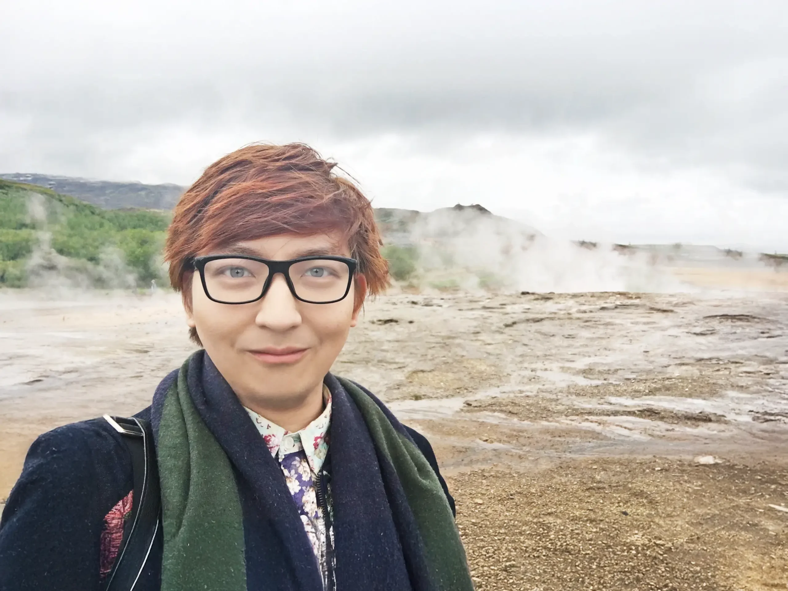 Stefano Malachi witnessing the raw, powerful eruption of the historic Great Geysir in the geothermal Haukadalur Valley of Iceland, capturing an unforgettable moment of high-end adventure.